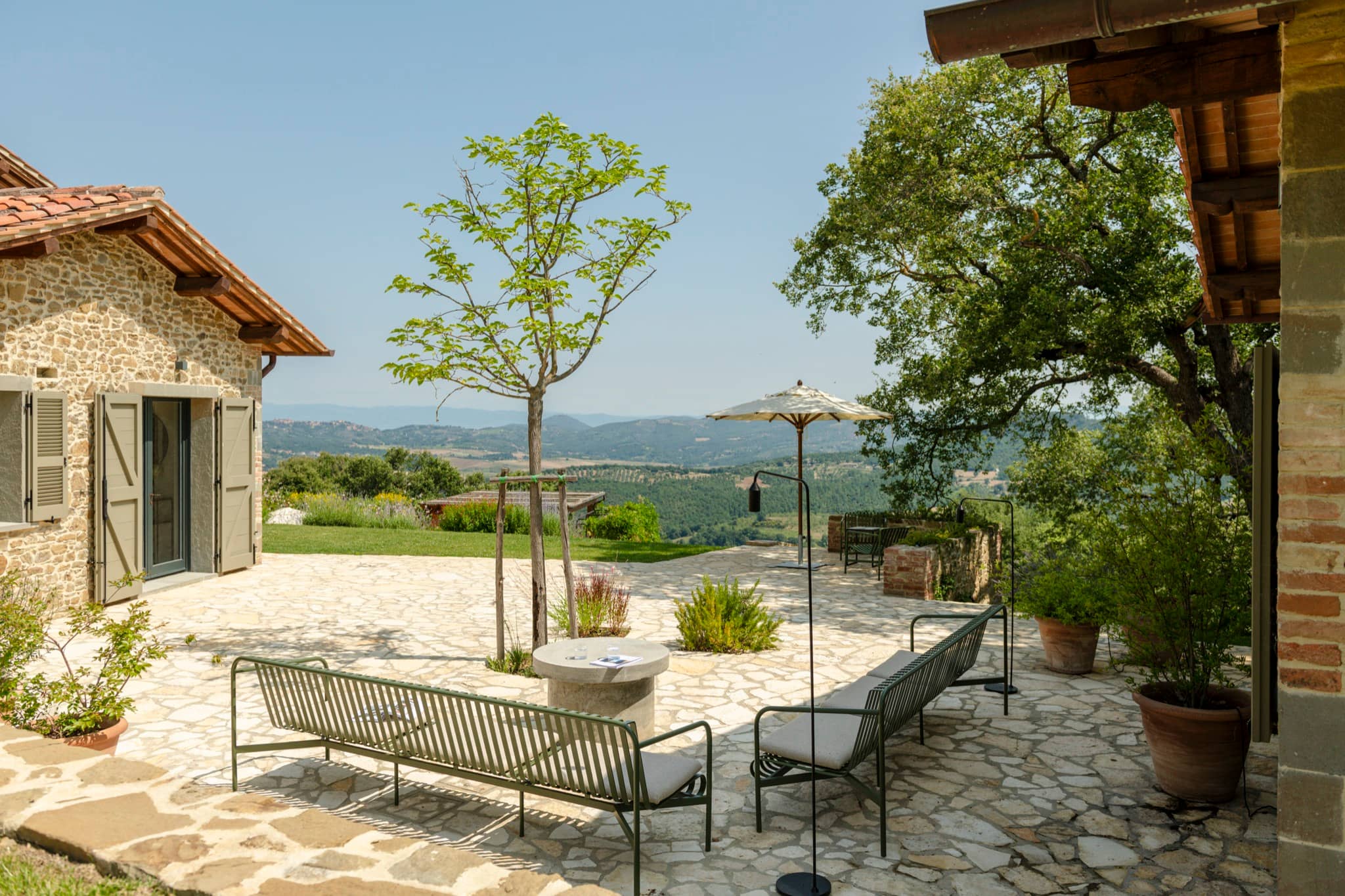 A stone terrace looking over the Umbrian hills
